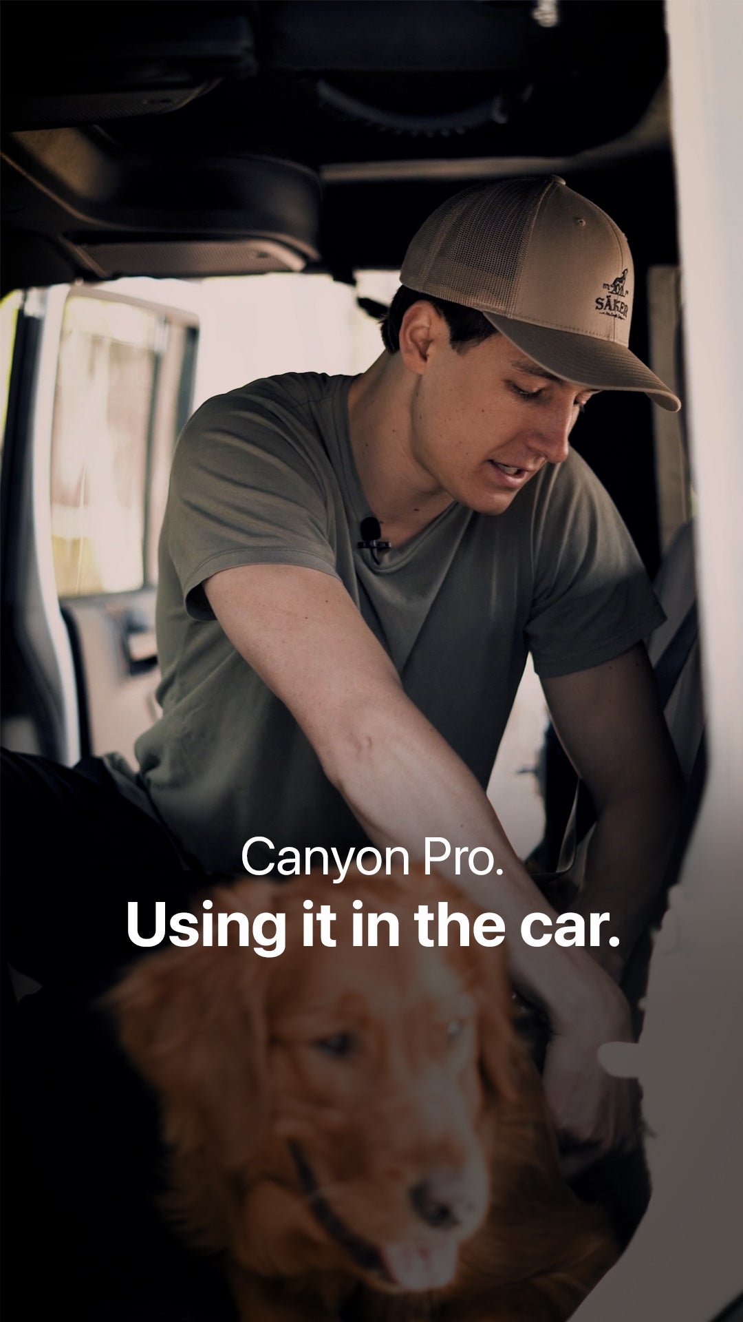 Cover of a man buckling his dog in the car using the Canyon Pro Core harness from Säker