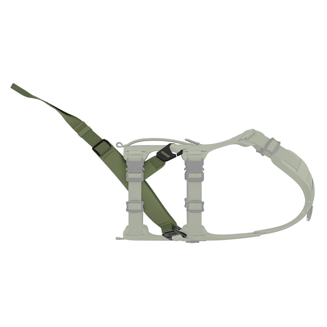 Side view of the Traction attachment 001 in Trail Green on the Muse harness