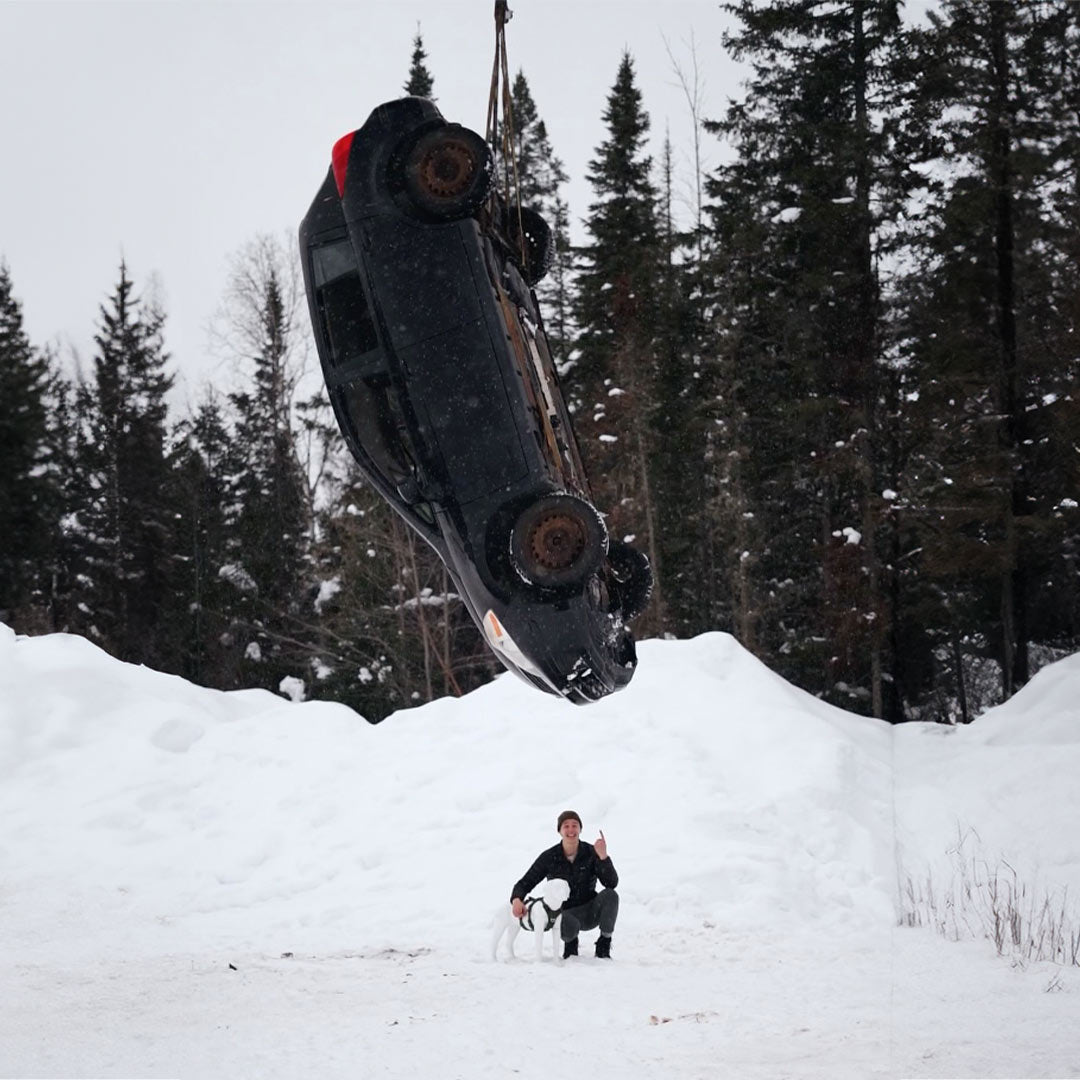 Car suspended in the air by a Canyon Pro harness