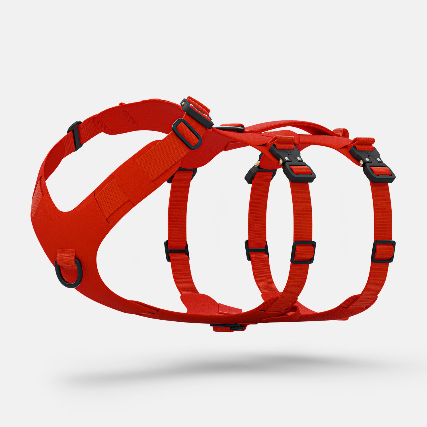 Diagonal view of the Bomber harness in Alpine Orange color