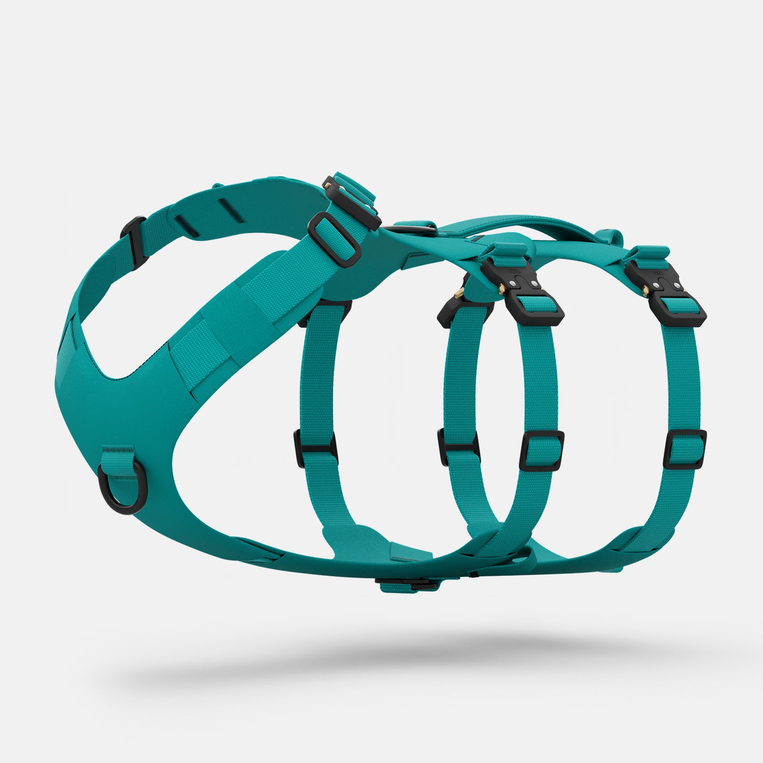 Diagonal view of the Bomber harness in Skeena Teal color