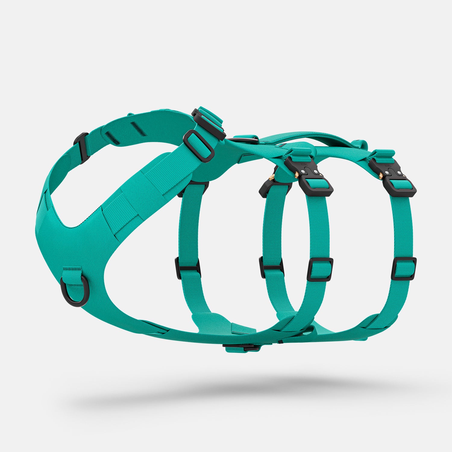 Diagonal view of the Bomber harness in Skeena Teal color