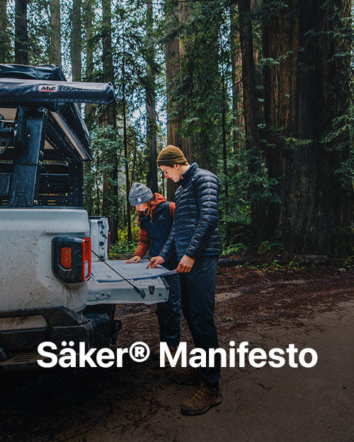 Cover image for Chris and kylie looking at harnesses plans in the trunk of Jeep